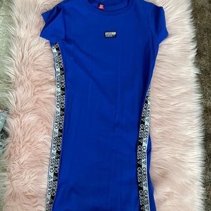 Brand new guess t-shirt dress size Xl stretchy material.